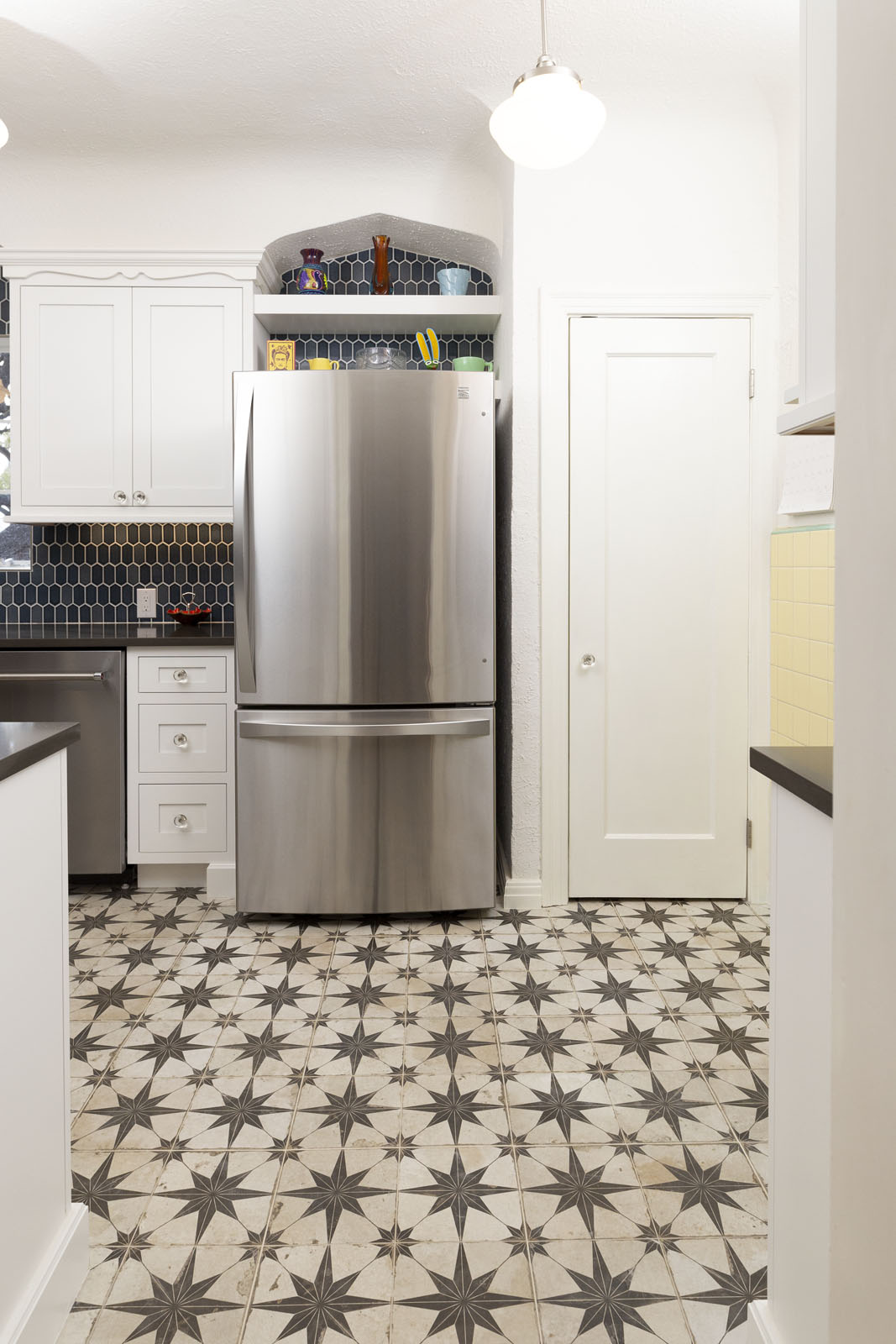 Monticello Park San Antonio kitchen makeover - blue hexagon backsplash and Kohler bridge faucet
