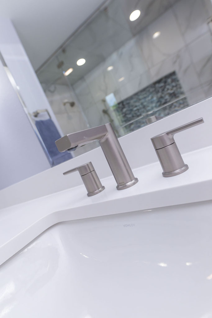 Bathroom vanity with Kohler undermount sink and Moen faucet in San Antonio remodel