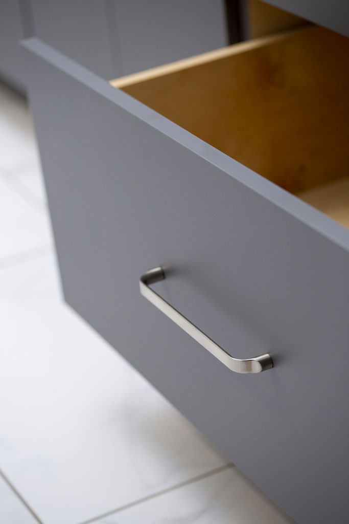Bathroom vanity cabinet with D-shaped Brenton satin nickel pull by Hardware Resources
