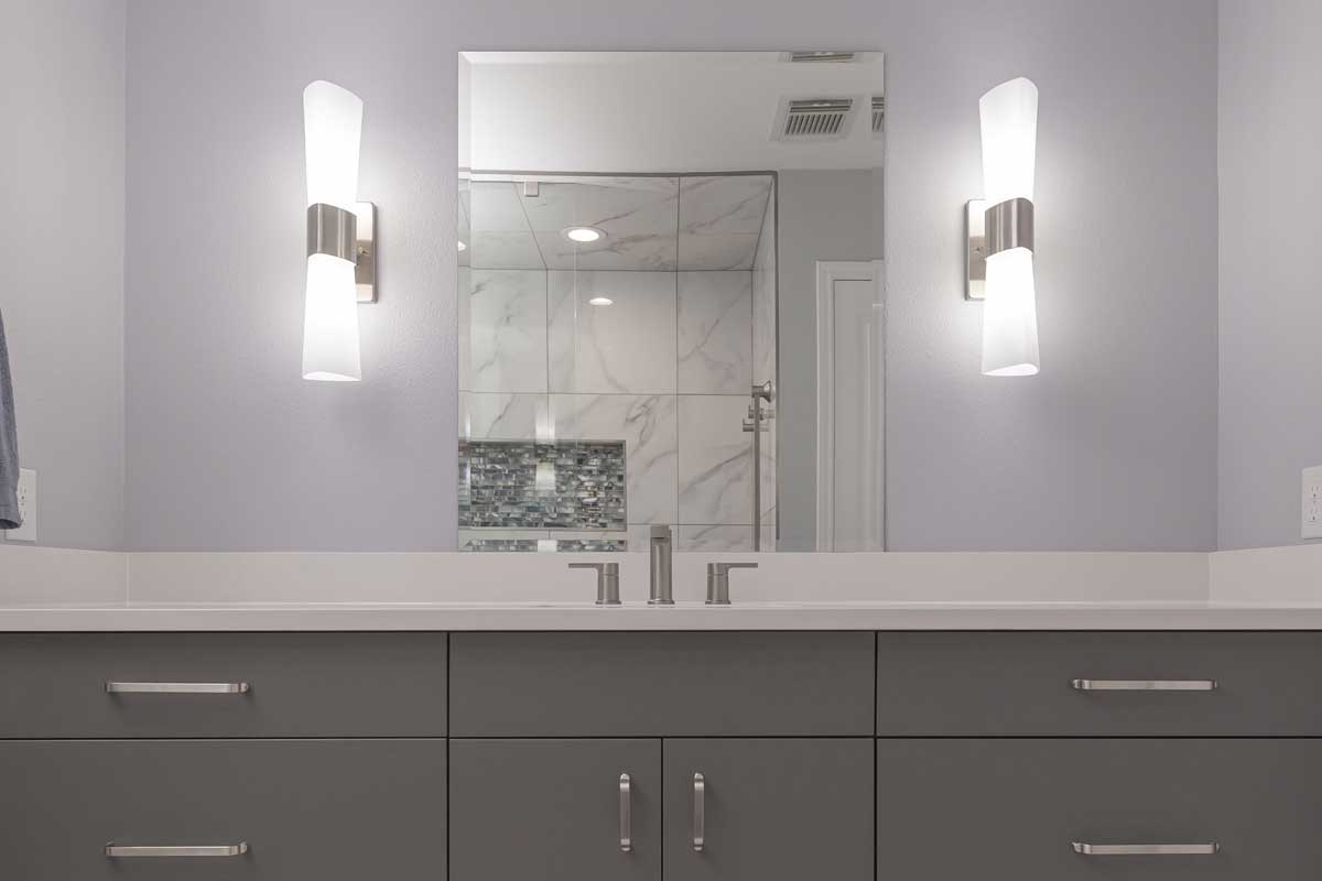 Bathroom remodel after with quartz countertop, undermount sink, and modern bathroom cabinets San Antonio