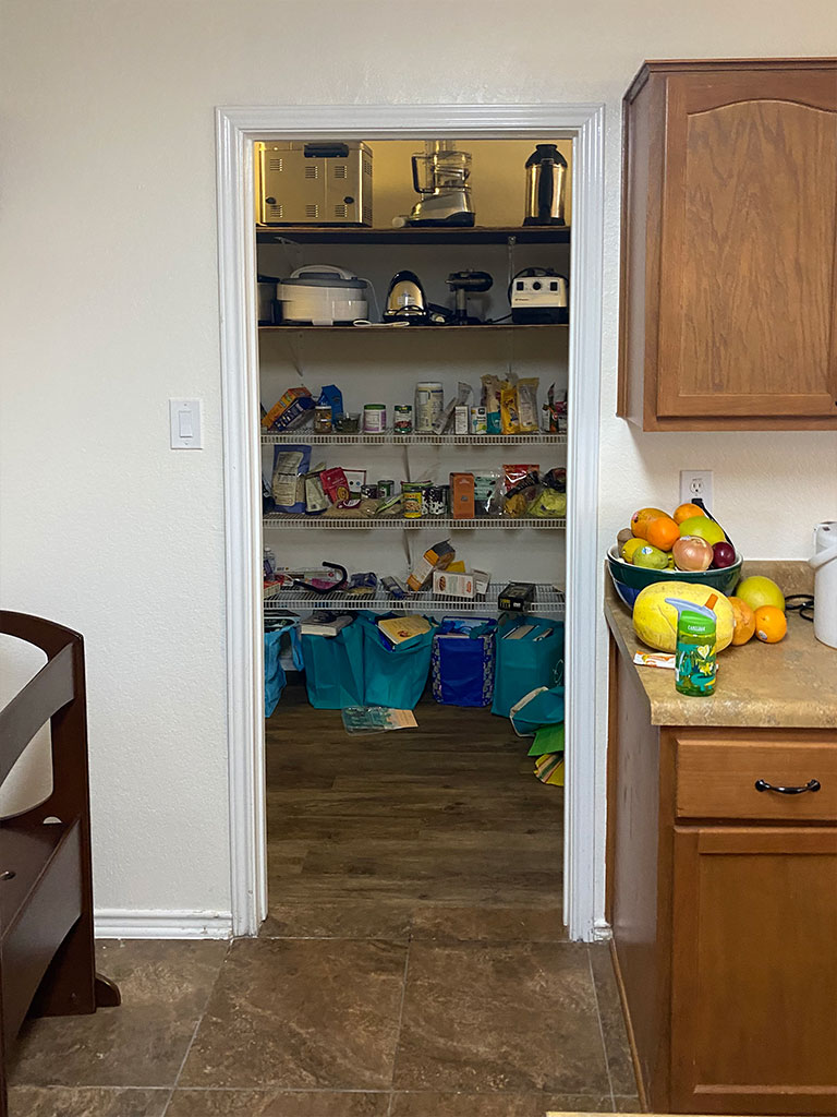 Before and after kitchen remodel comparison with island and lighting San Antonio