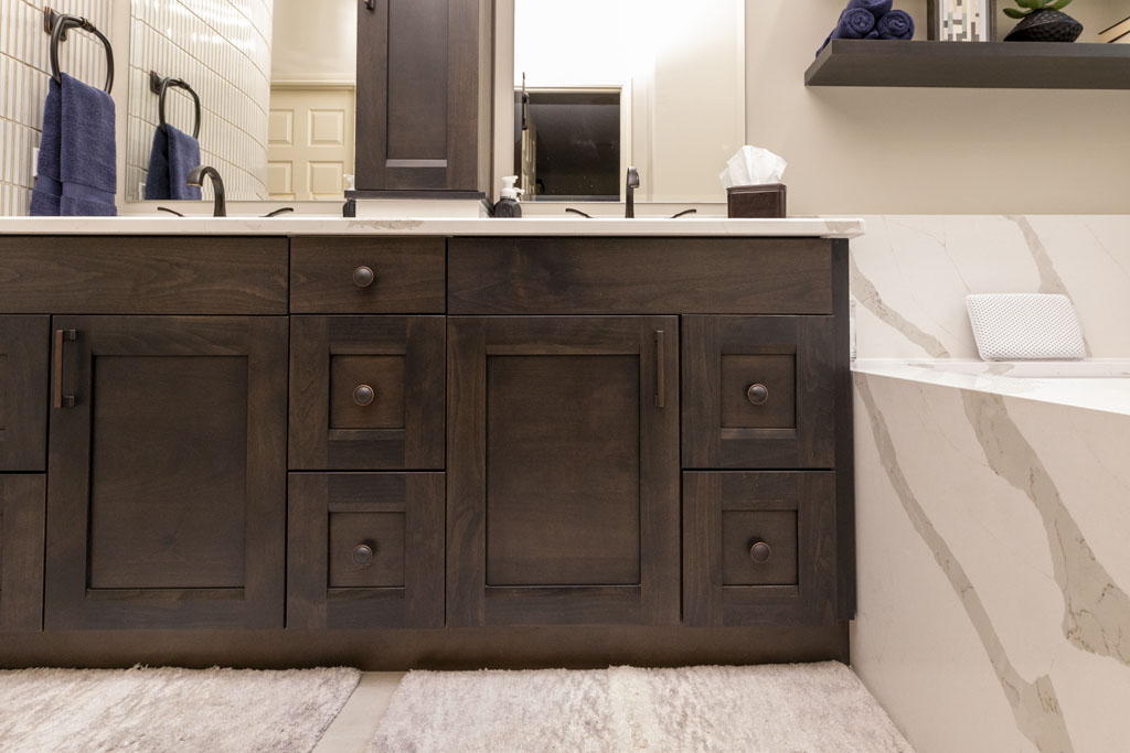 Master bathroom dual vanity with Belmont 1600 Series French Roast Black cabinetry and Calcatta Bali Quartz countertop in San Antonio TX